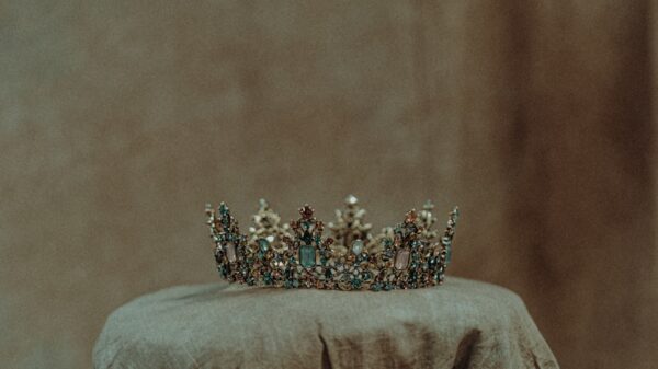 white and yellow flowers on brown textile