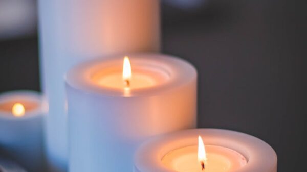 A close-up of a serene candlelight arrangement with a soft, soothing glow.
