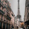 Captivating street view of the Eiffel Tower in Paris, showcasing classic architecture.