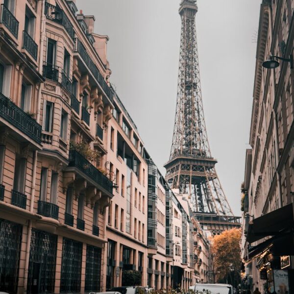 Captivating street view of the Eiffel Tower in Paris, showcasing classic architecture.