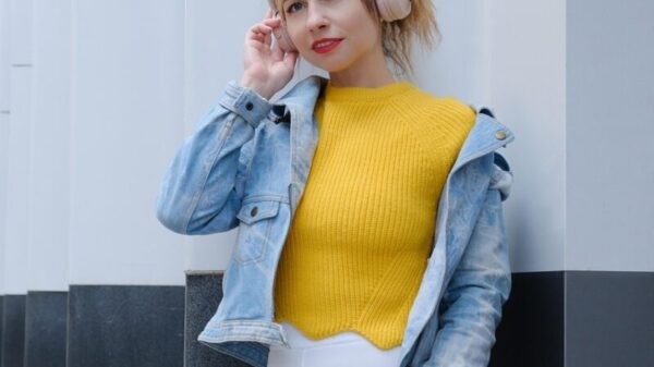 woman, headphones, music, modern, street, white leggings, city, fashion, style, jean jacket, ponytail hairstyle, columns