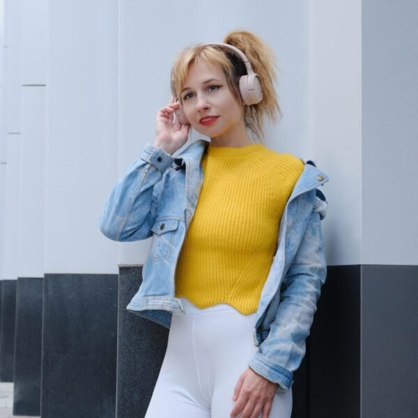 woman, headphones, music, modern, street, white leggings, city, fashion, style, jean jacket, ponytail hairstyle, columns
