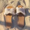 brown and white leather sandals