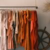 a row of clothes on a swinger