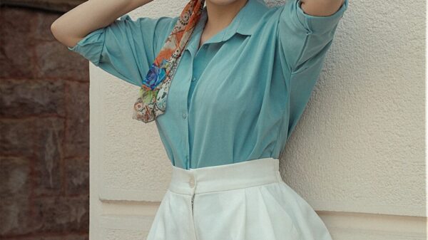 a young girl in a blue dress