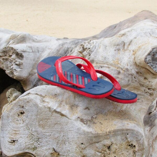 a pair of sandals on a rock