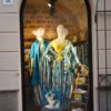 a couple of statues in a doorway
