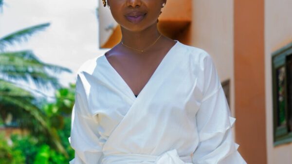 woman in white dress shirt and black skirt