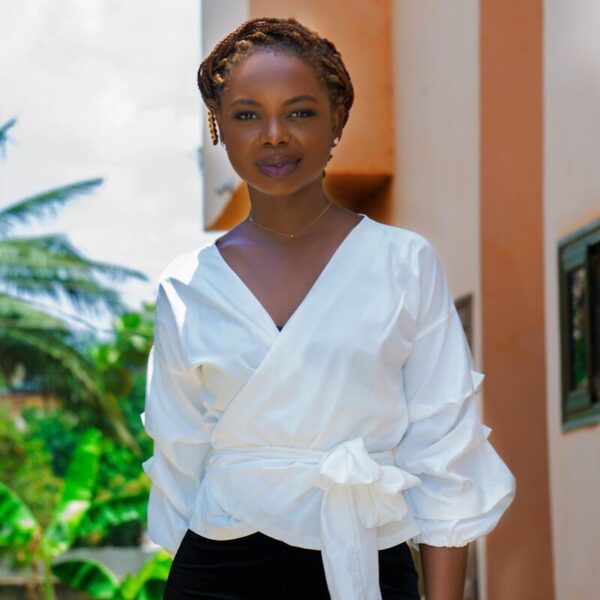 woman in white dress shirt and black skirt