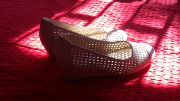 white and red flats on red textile