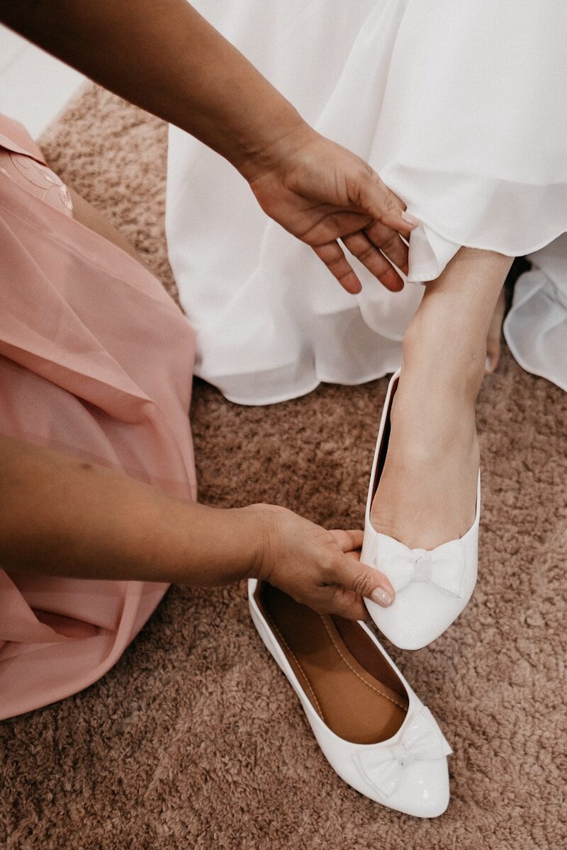 woman in white dress and white peep toe pumps